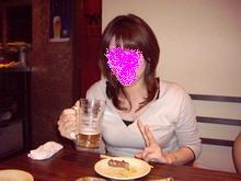 飲む人