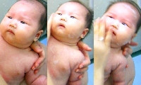 赤ちゃんの顔を洗う